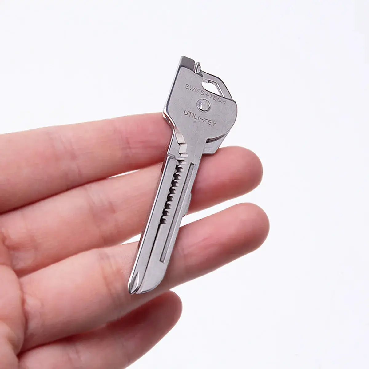 Simples Market 6-in-1 folding tool keychain in silver, compact EDC with opener and screwdriver.