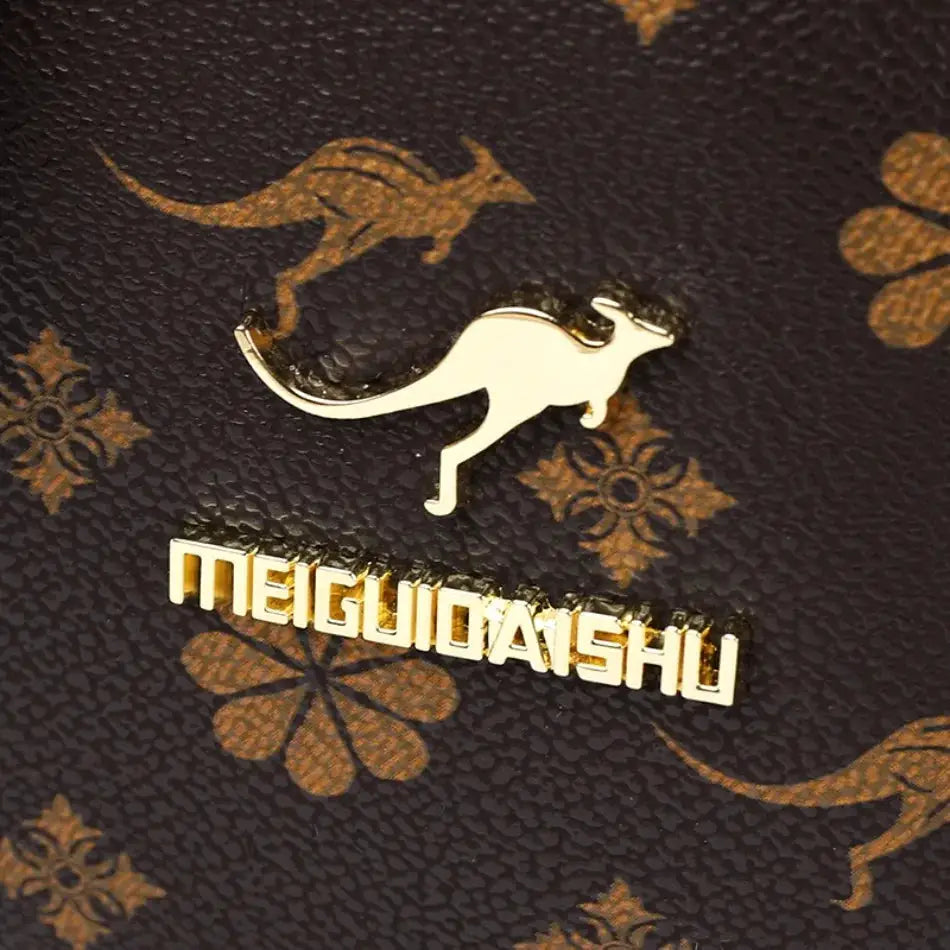 Ladies backpack Simples Market brown textured leather with gold kangaroo logo and lettering