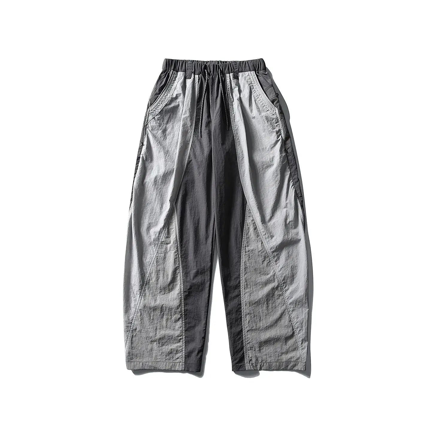 Wide-leg techwear cargo pants in gray two-tone panels with drawstring waist and lightweight quick-dry fabric