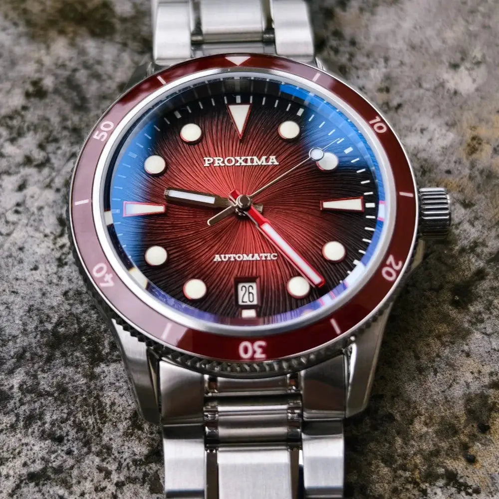 Proxima 39mm dive watch with red sunburst dial, blue ring, red bezel, stainless steel bracelet, automatic, 100m WR.