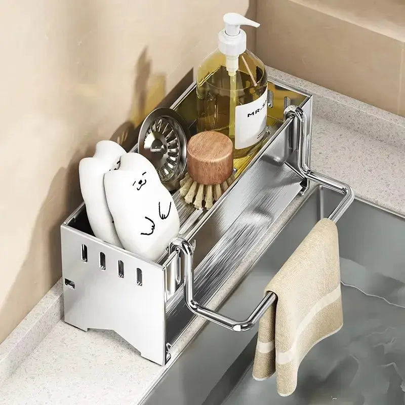 Stainless steel kitchen sponge rack with pump bottle holder, brush, and two sponges