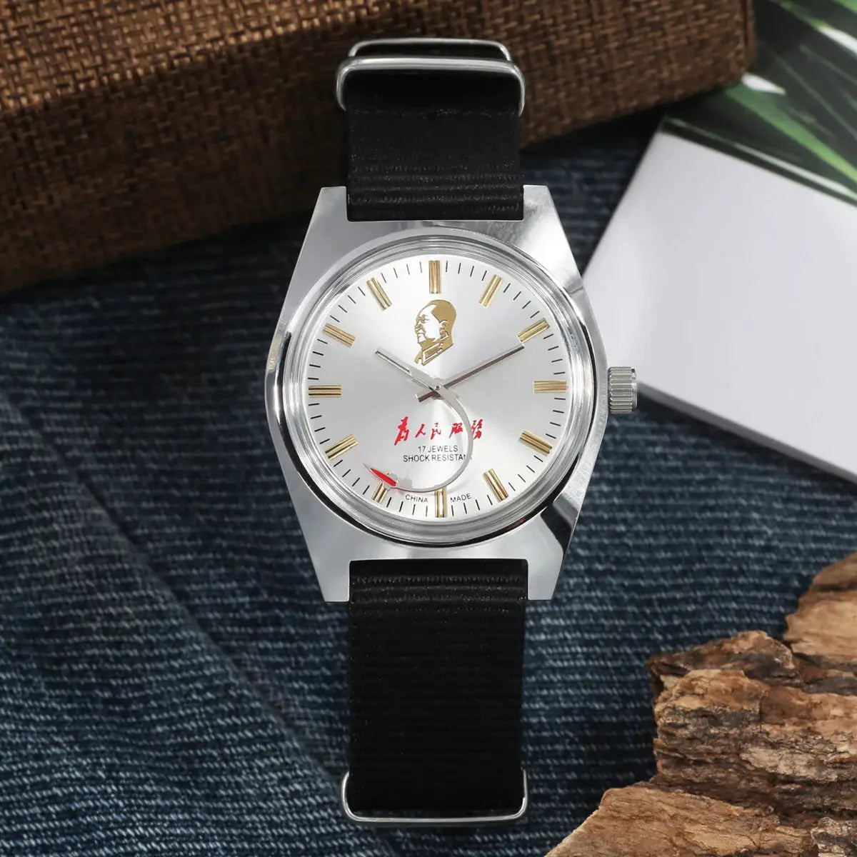 7120 hand-wind men's watch by Simples Market, silver case, white dial with gold-tone indices, black fabric strap