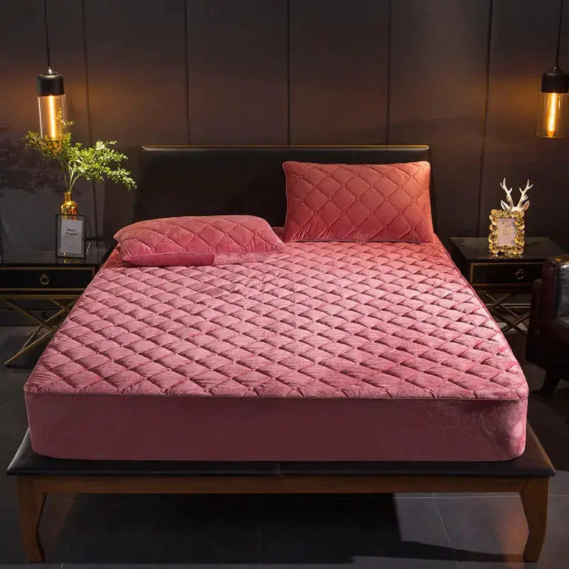 Plush thickened quilted mattress cover in crystal velvet pink; fitted, king/queen size.