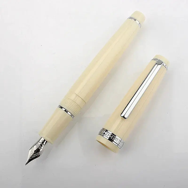 Jinhao 82 fountain pen in ivory acrylic with silver trim and clip, nib exposed