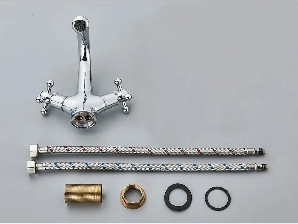 Antique chrome bathroom faucet mixer with two cross handles; includes braided hot and cold supply hoses and fittings.