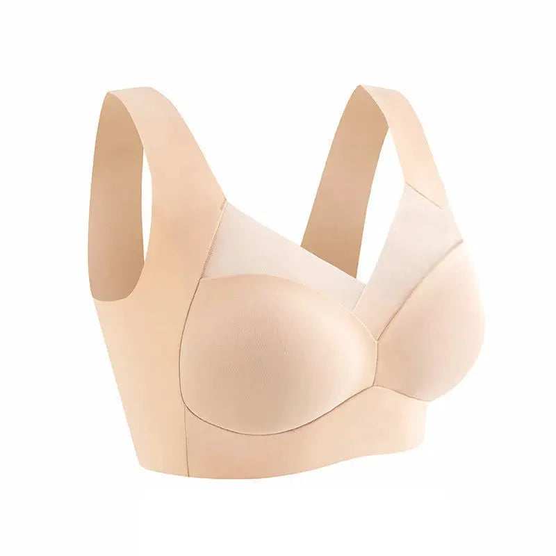 Beige seamless wireless bra for women with wide straps and smooth cups.