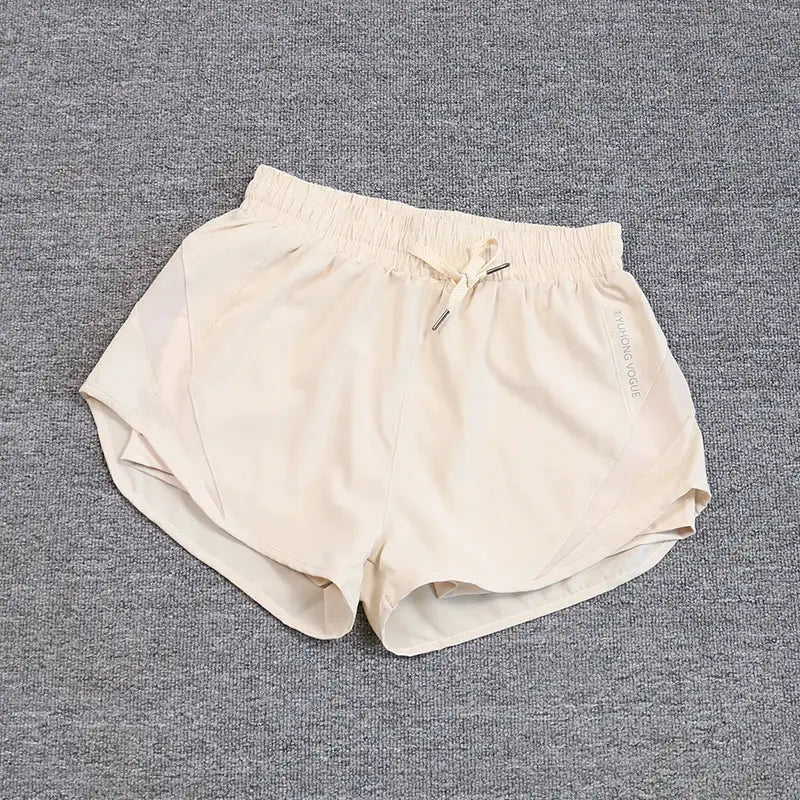 Women's beige running shorts, breathable quick-dry fabric with drawstring, Simples Market.