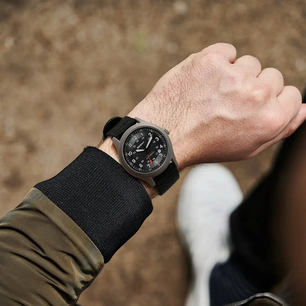 BERNY automatic titanium field watch for men with black dial and white numerals on black fabric strap