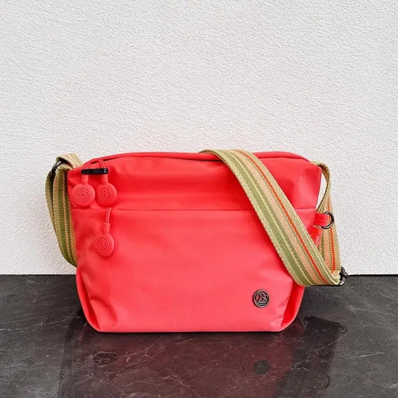 Ultra-light nylon crossbody bag in coral by Simples Market