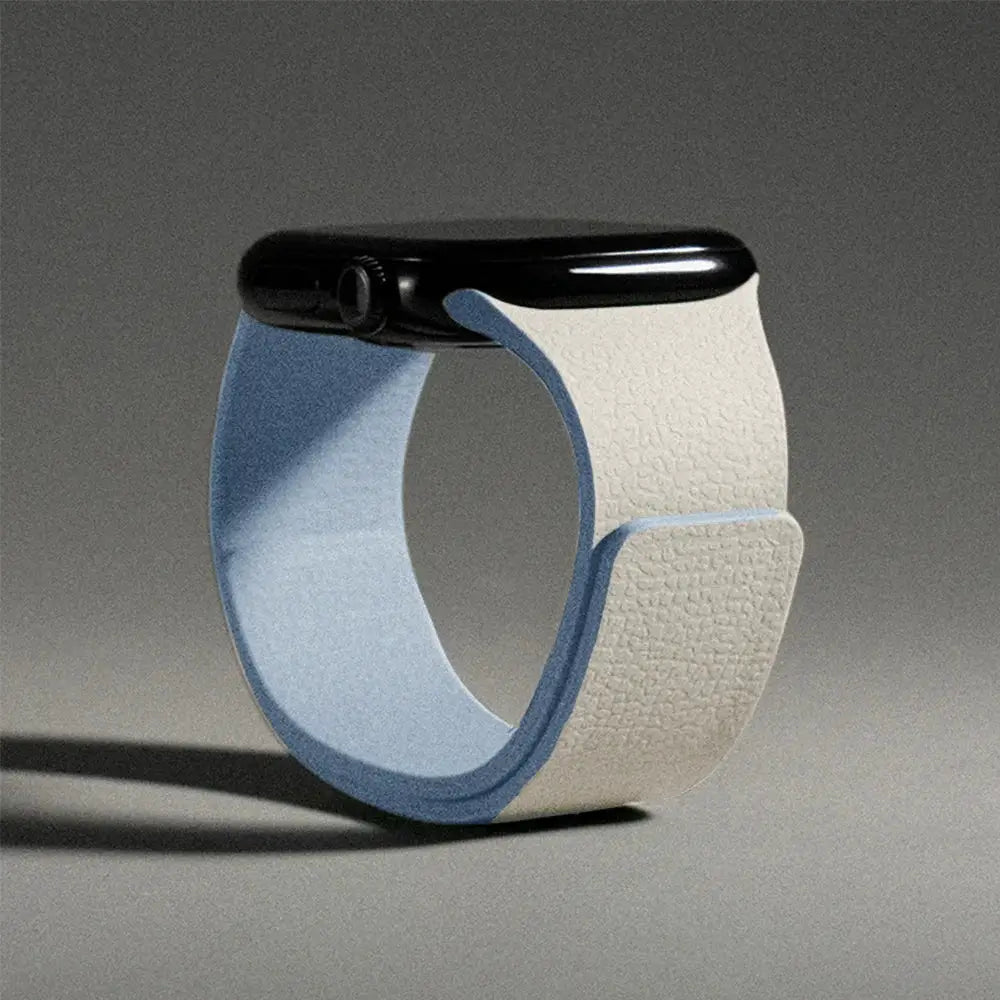 Silicone magnetic strap for Apple Watch band, blue inner surface with beige textured exterior, fits 40–49mm.