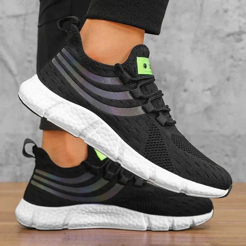 Men’s sneakers by Simples Market, black knit upper with iridescent side stripes, white platform sole pair