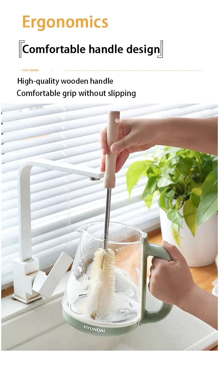 Wooden-handled bottle cleaning brush with a long metal shaft scrubs a HYUNDAI glass kettle