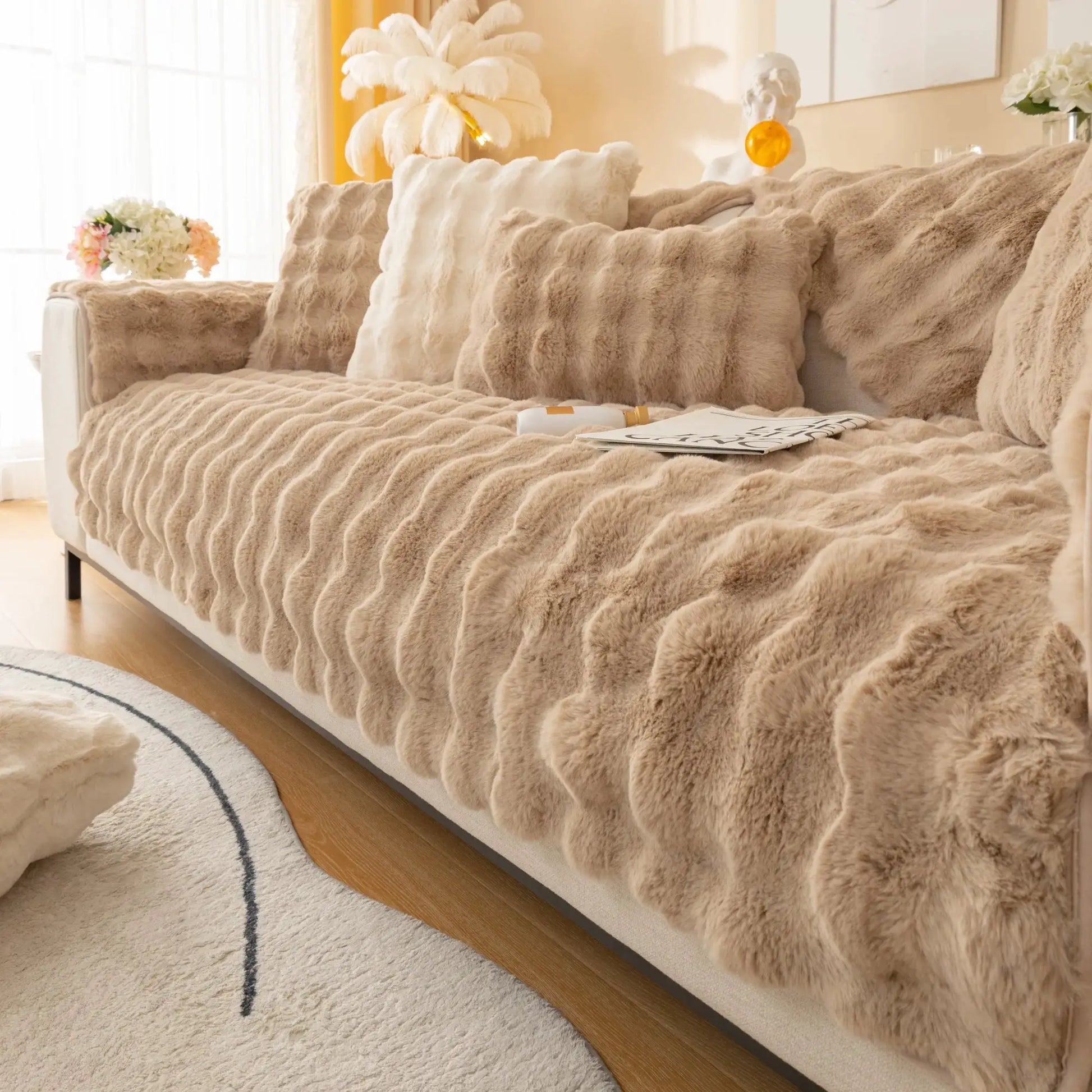 Thicken imitation rabbit fur non-slip sofa slipcover by Simples Market in beige with plush cushions