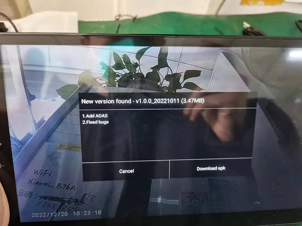 Black car dash cam with 1080P display showing software update screen