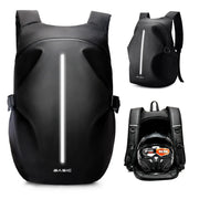 Motorcycle backpack 40L, black waterproof with reflective vertical stripe; BASiC logo visible and helmet shown inside.