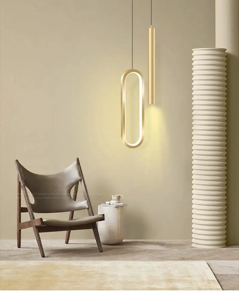 Nordic LED pendant lights set (2) by Simples Market; warm-gold oval loop and vertical tube pendants.