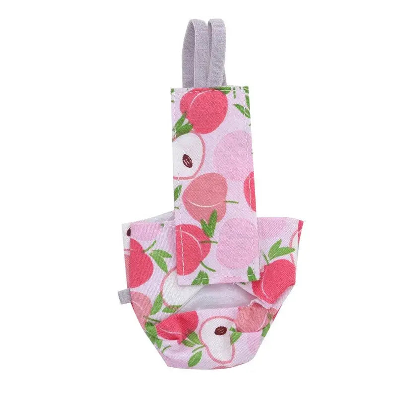 Parrot diaper with bowtie; pink fruit-floral pattern, lavender straps, washable bird flight suit