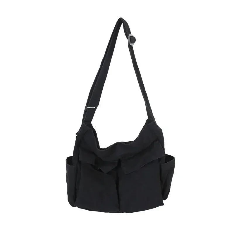 Simples Market women's black canvas messenger bag with large capacity and side pockets