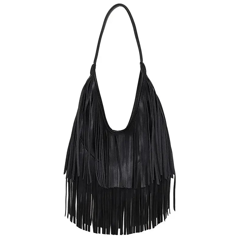 Long tassel fringe handbag by Simples Market in black PU leather with single shoulder strap.