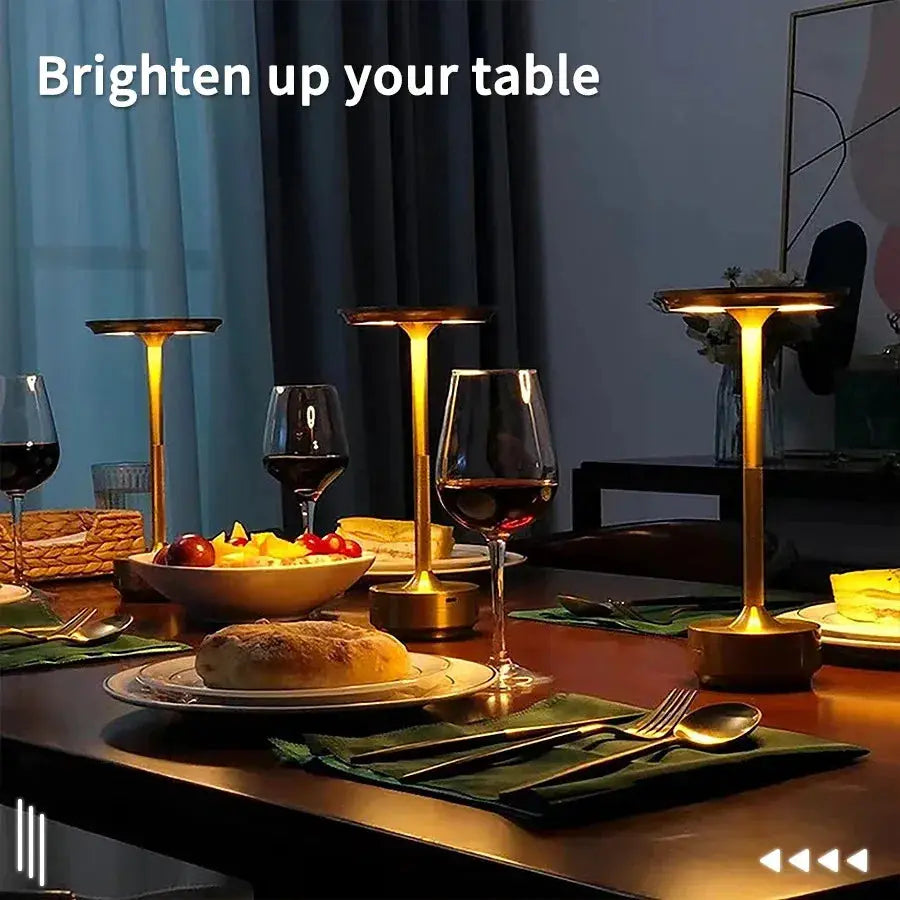 Three wireless decorative table lamps in gold finish; infinitely dimmable, touch-controlled, portable.