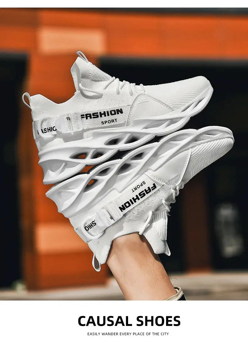Pair of white sneakers by Simples Market with mesh upper and thick sculpted sole