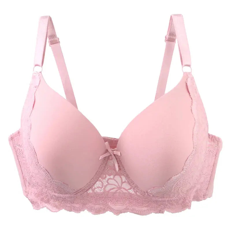 Pink lace push-up bra with scalloped trim and center bow
