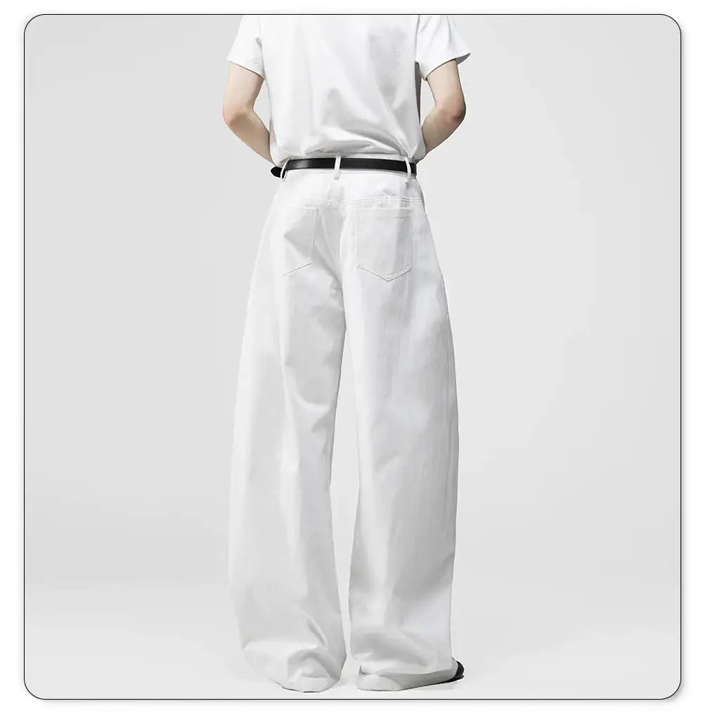 Men's white baggy wide-leg denim jeans with back pockets and black belt