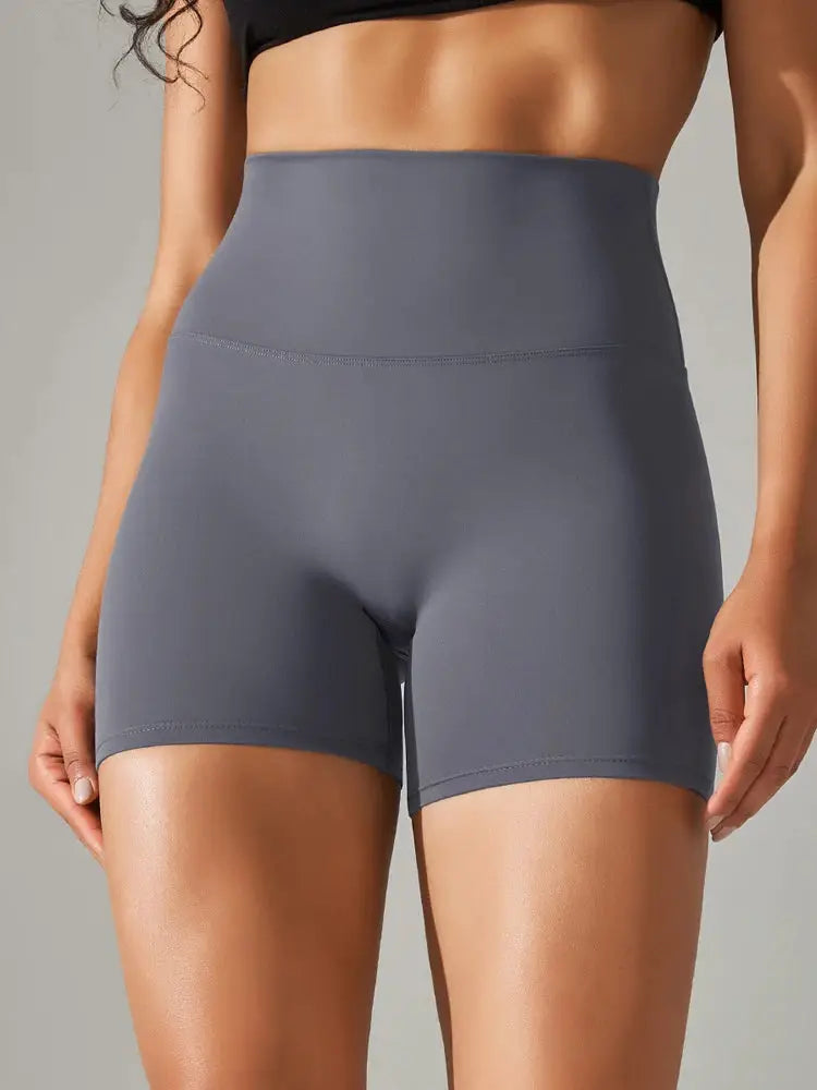 Women’s high-waist gray yoga shorts; squat-proof, quick-dry athletic gym wear.