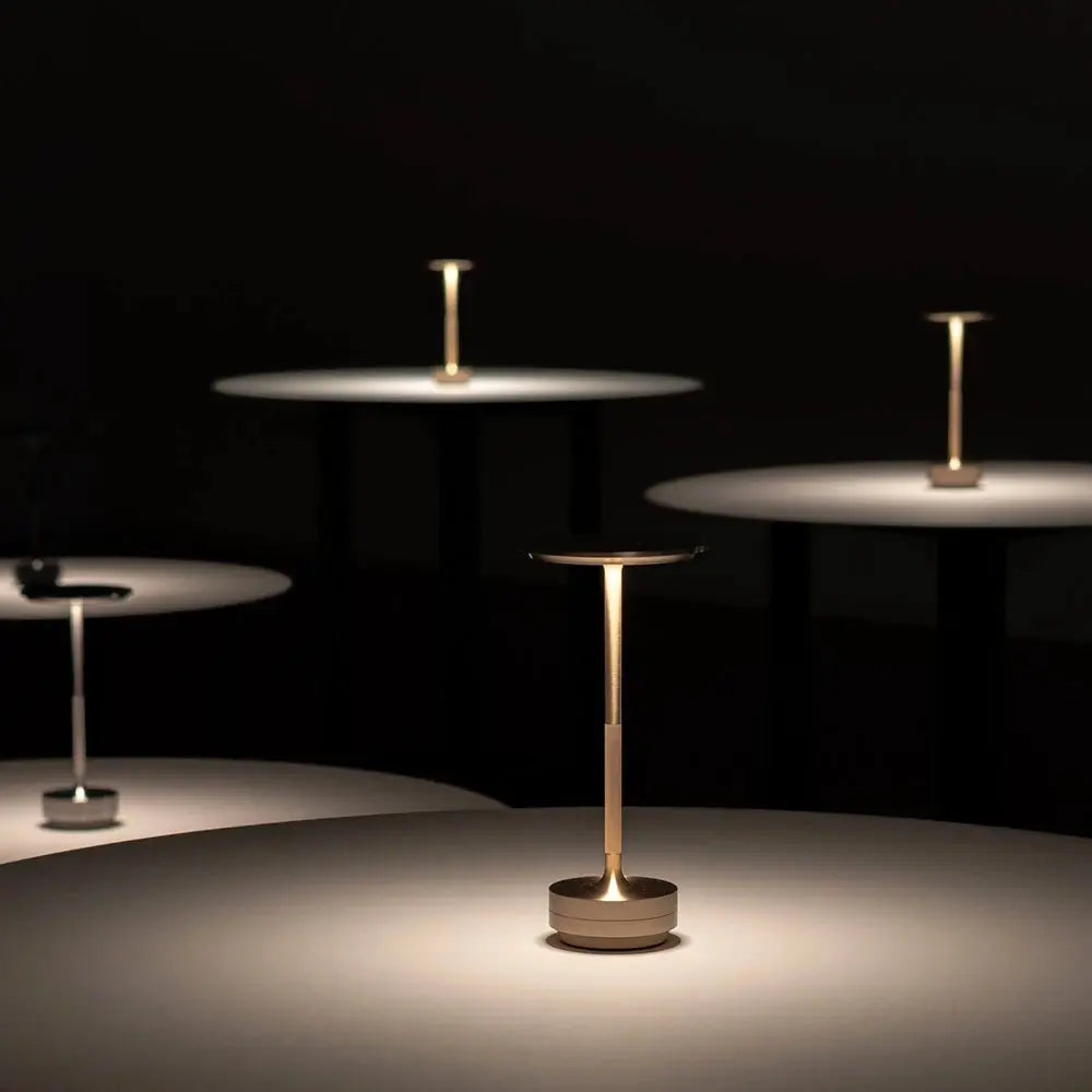 Wireless Simple Decorative Table Lamp by Simples Market, infinitely dimmable, gold-tone touch desk lamp; trio on display.