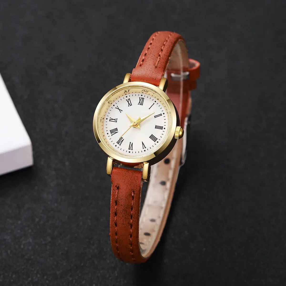 Women's leather-band quartz watch with gold-tone case, white Roman numeral dial, brown strap by Simples Market