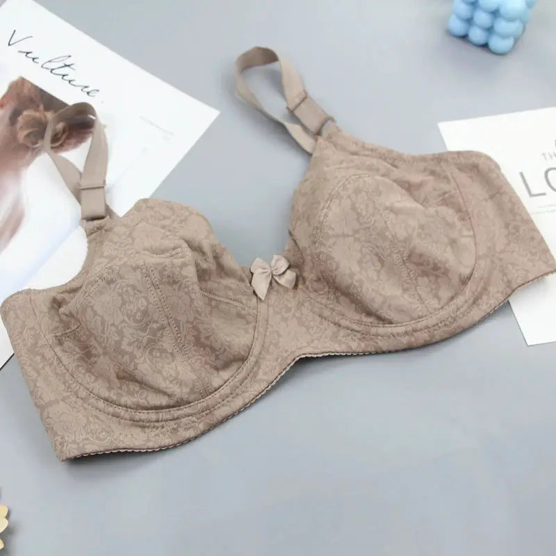 Bra from Simples Market; beige lace with bow, ultrathin cups and adjustable straps