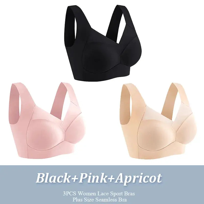 Three-pack plus-size women's seamless wireless sport bras in black, pink and apricot