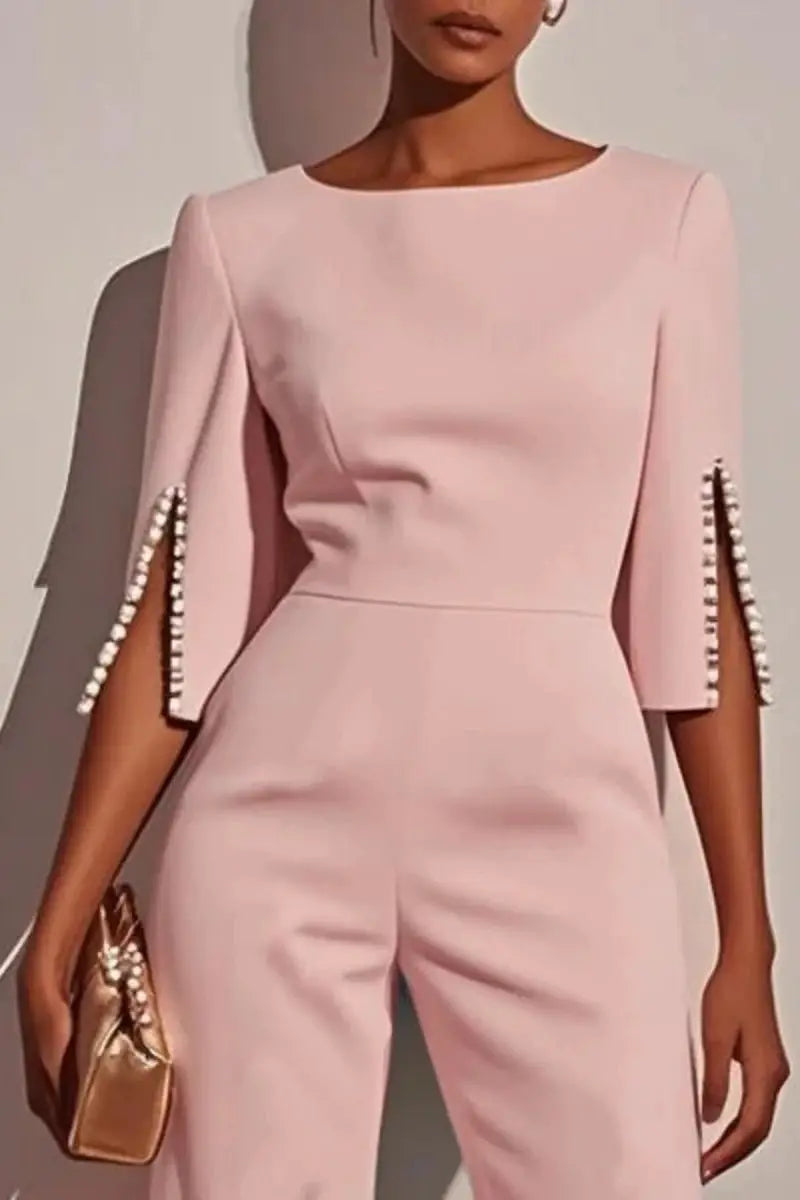 Pink women's jumpsuit with round neckline, 3/4 sleeves with pearl bead trims, high-waist, straight fit.