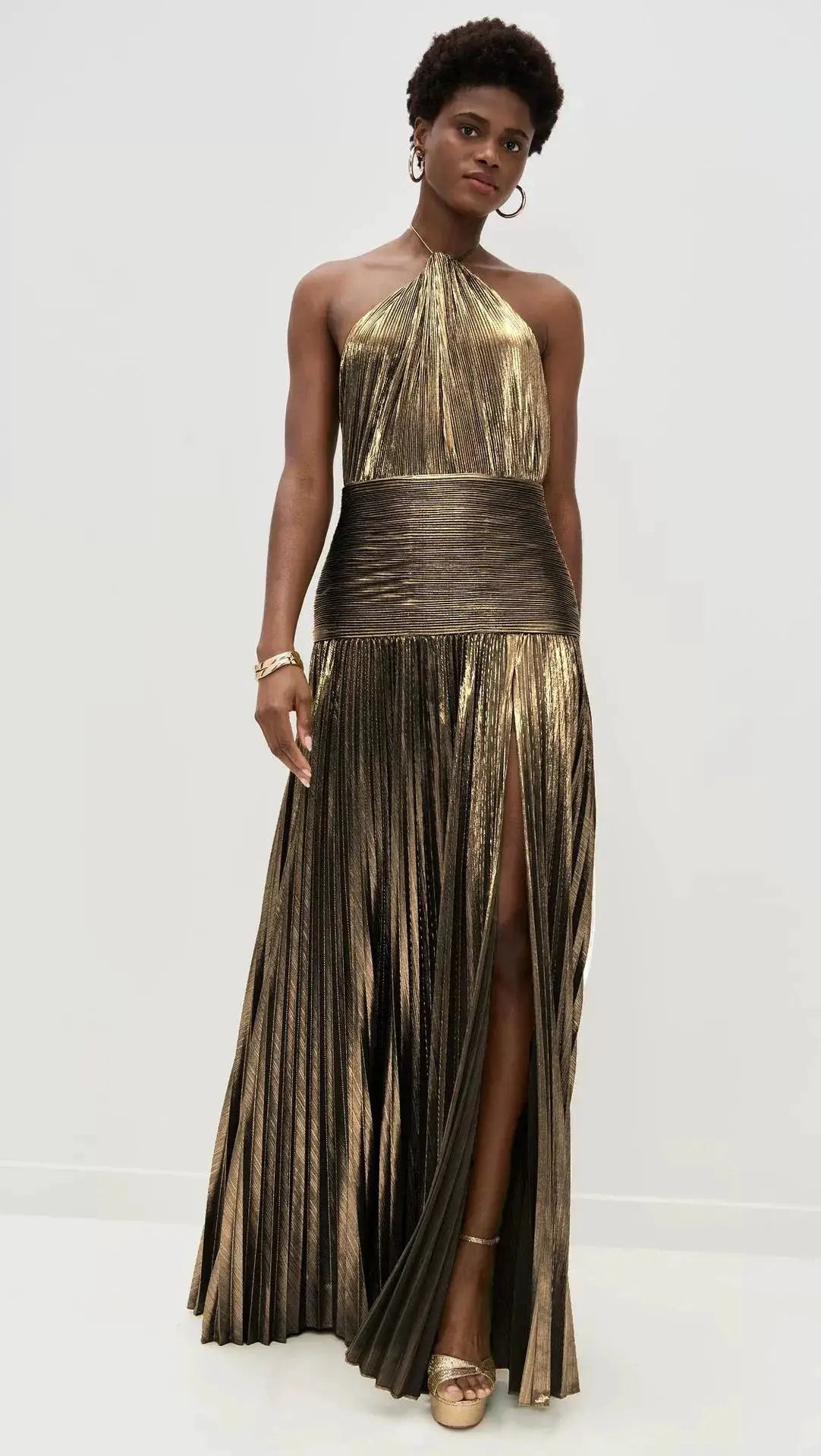 Aurora Gold Halter Neck Evening Dress With Backless Pleated Silhouette And Hip Slit For Formal Occasions
