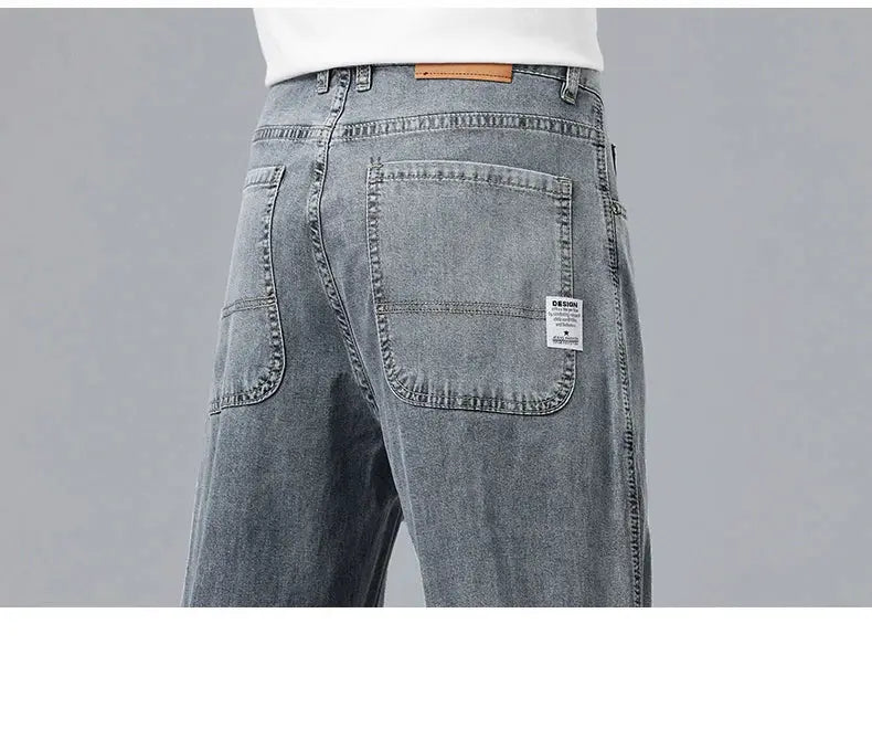 Men's light blue denim jeans with two back pockets