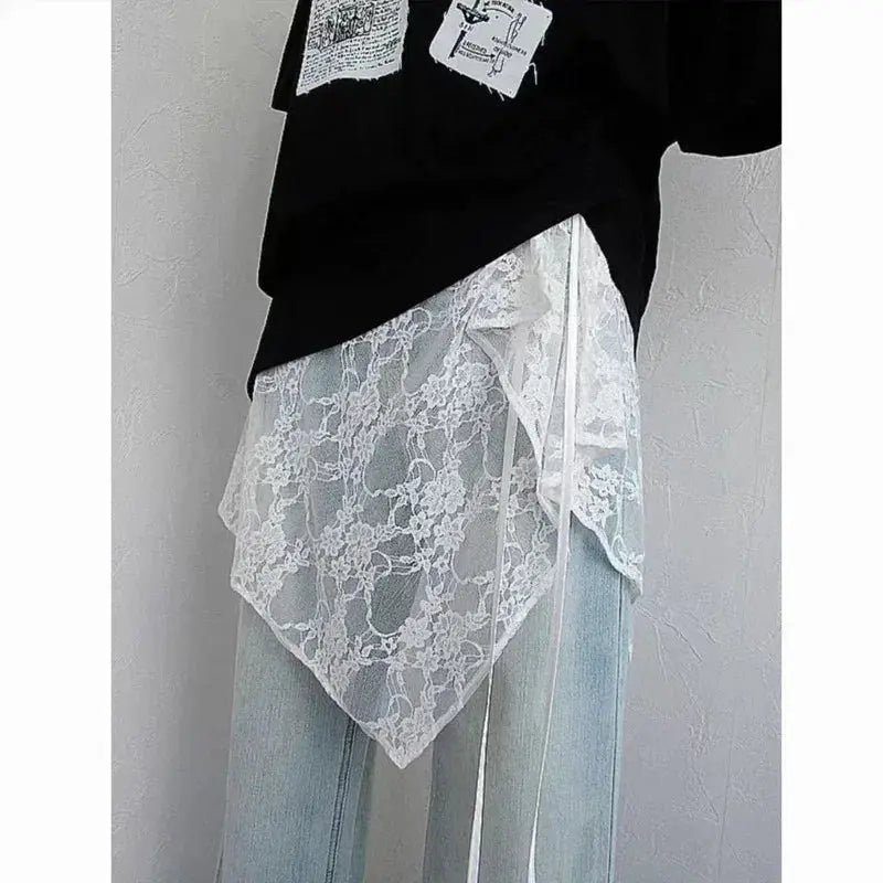 Simples Market lace wrap skirt with white floral lace overlay over light denim jeans