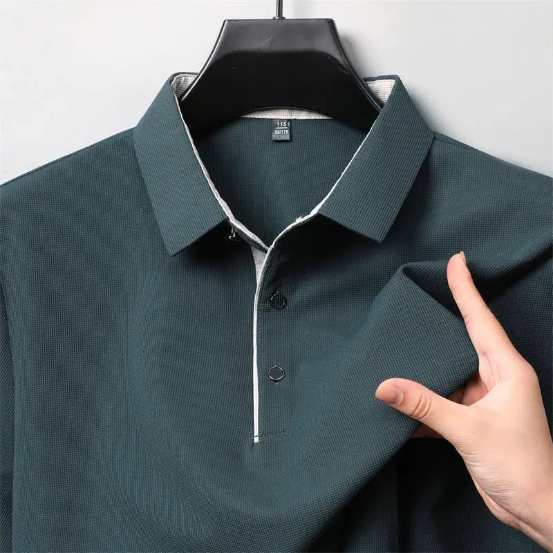 Men's teal long-sleeve polo shirt with white piping, textured pique fabric