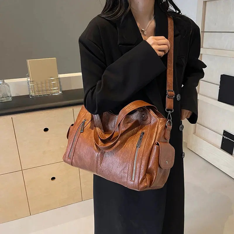 Simples Market brown PU leather shoulder bag with soft interior, dual handles and crossbody strap