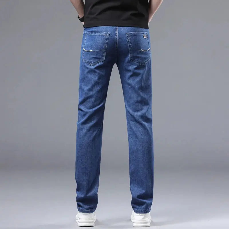 Wthinlee men's blue denim jeans with straight leg fit and back pockets.