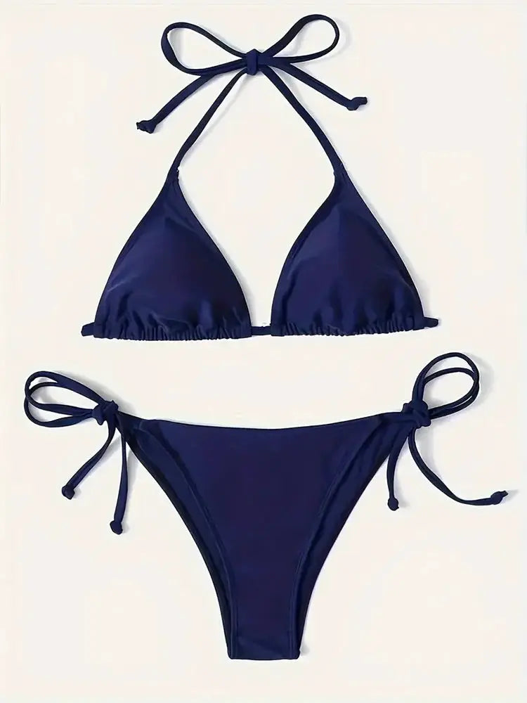 Navy blue two-piece bikini set with triangle halter-top and side-tie bottoms