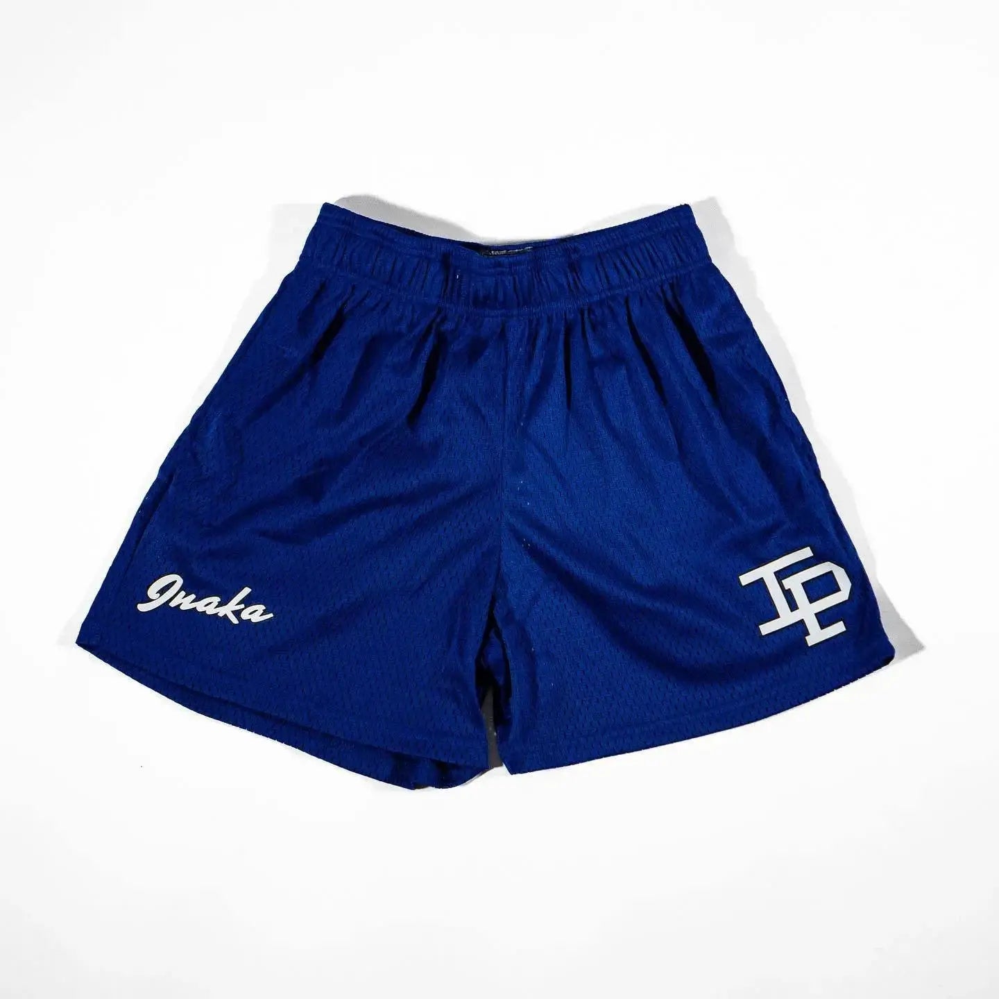 Men's blue mesh gym shorts with elastic waistband; white Inaka logo on left leg and TP logo on right leg.