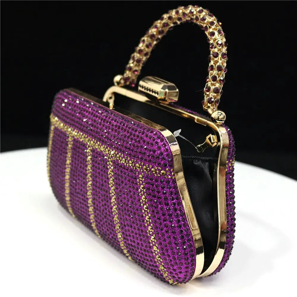 Purple rhinestone evening clutch with gold-tone frame and jeweled handle