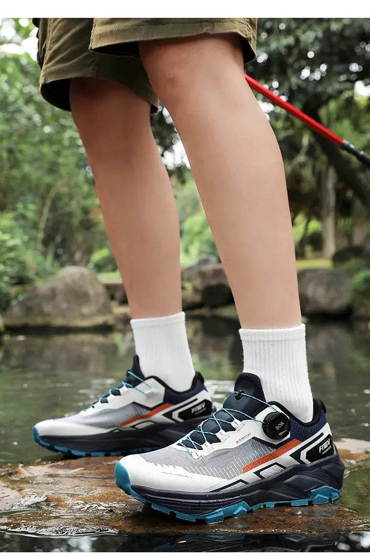 Simples Market men's breathable luxury trainer sneakers, two sneakers shown, grey/white with teal accents and orange stripe