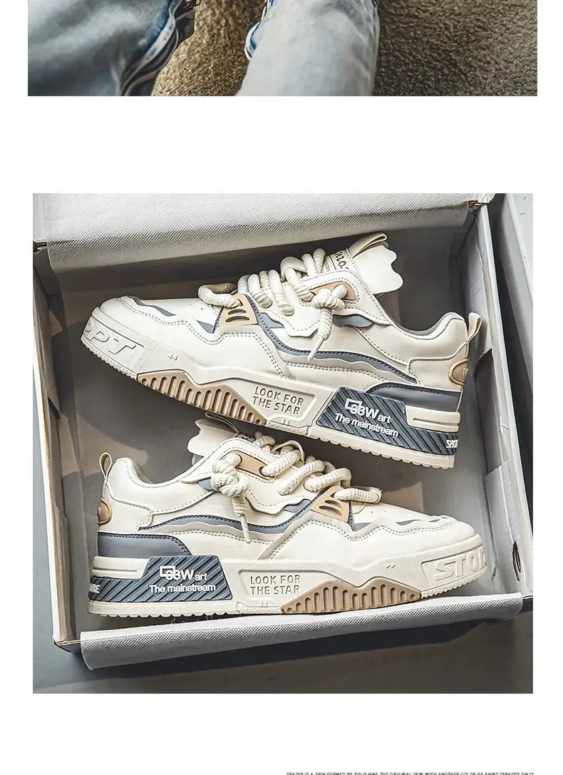 Men's trendy skate shoes in cream and white with blue accents, lace-up casual sneakers inside a shoebox