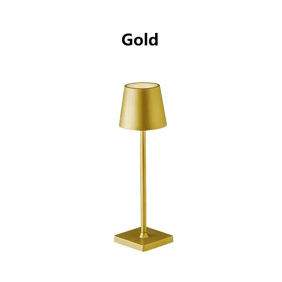 Gold LED desk lamp with a slim stem and square base, USB rechargeable and wireless touch control.