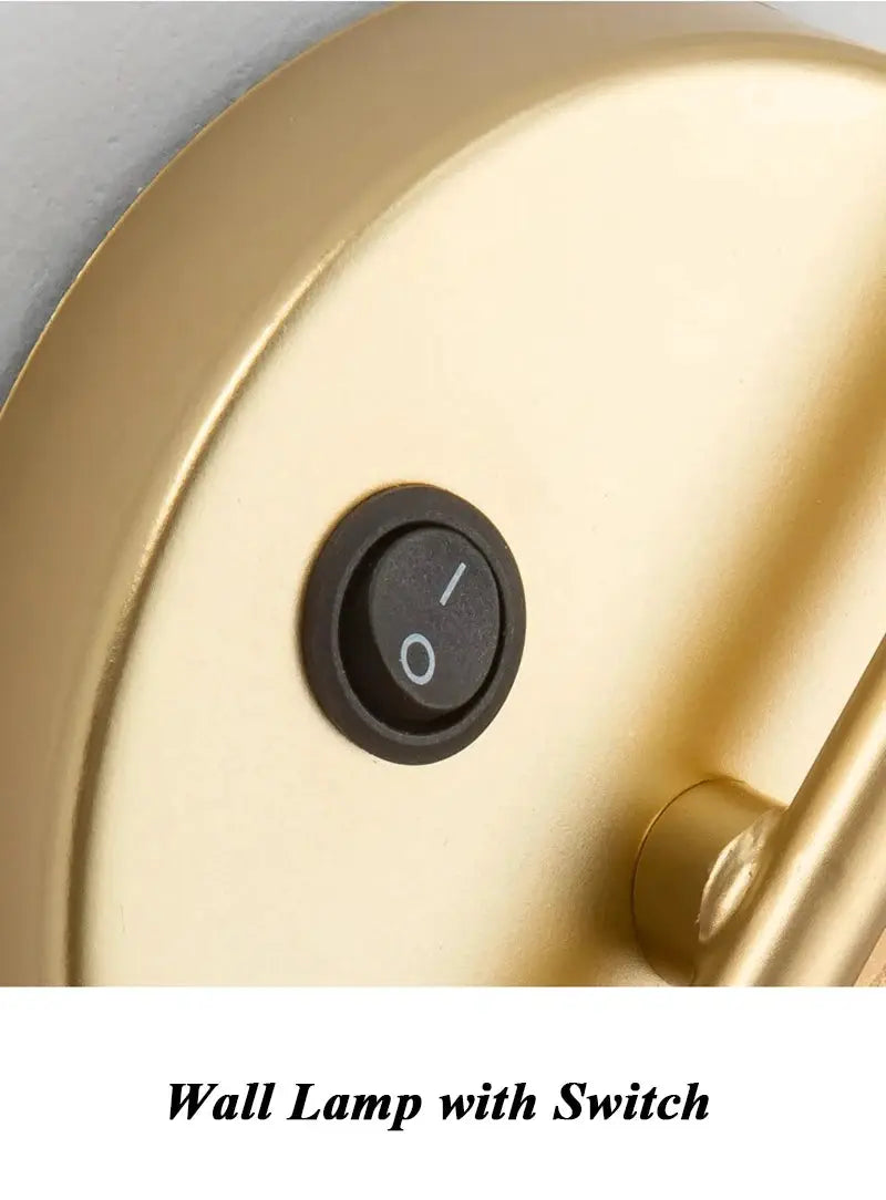 Wall lamp with switch; gold iron frame and black round on/off switch