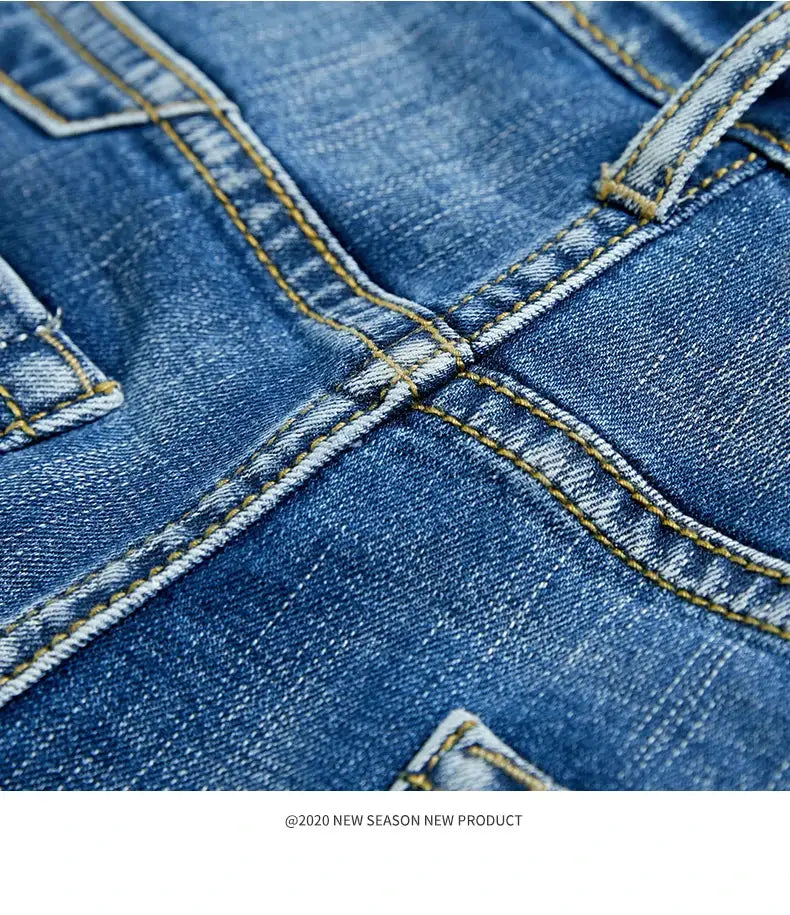 Men's slim denim shorts, blue stretch denim with yellow contrast stitching