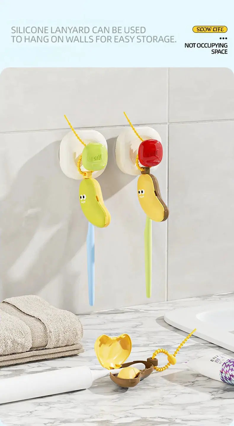 Banana toothbrush protective cap with toothpaste storage box by Simples Market, 2-pack, yellow banana shapes with green and red caps.