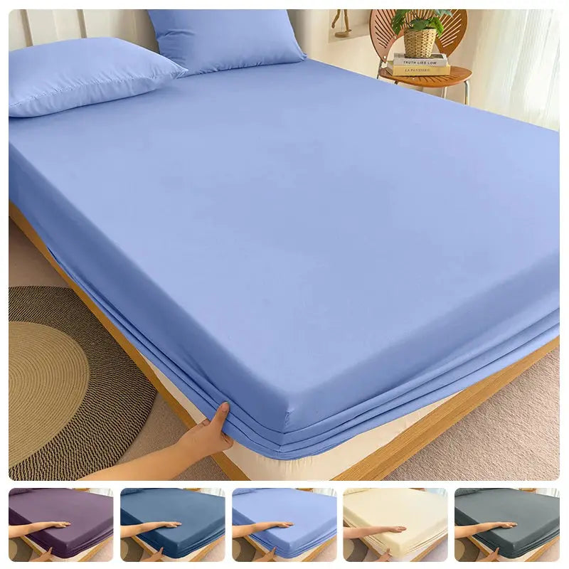 Simples Market light blue polyester fitted bed sheet with elastic corners.