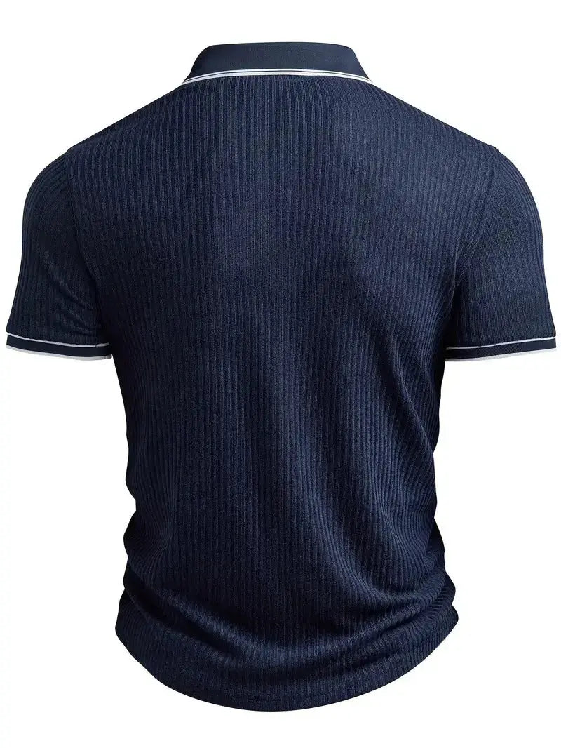 Men's navy polo shirt, short sleeves, ribbed-knit with white trim on collar and cuffs.